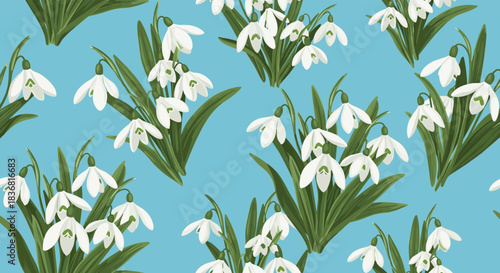 Seamless spring floral pattern with delicate white snowdrop flowers and green leaves on a light blue background for textiles.