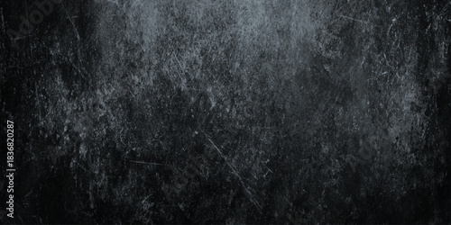 Abstract Black and White Grunge Texture Background with Vintage Distressed Effect with subtle scratches, stains, and eroded details.