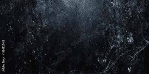 Dark grunge black texture with scratches, dust and splatters for both print and digital use.