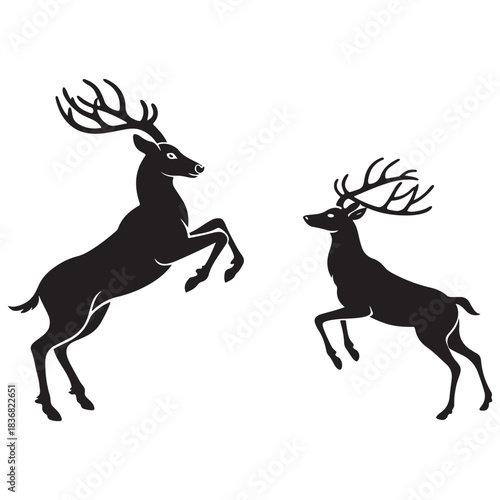 Stag jumping and rearing silhouettes Vector