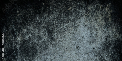 Dark Distressed Wall Texture Background with Scratches white dust, and subtle spatter for wall design.
