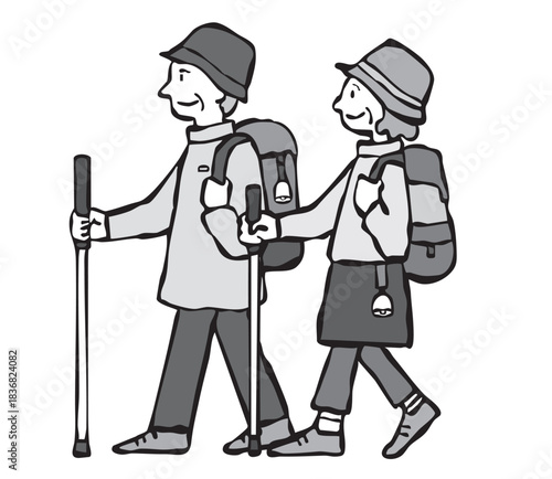 熊よけの鈴をつけてハイキングをする男女（シニア）