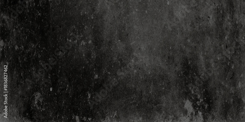 A wide panoramic background image featuring a dark and dramatic grunge concrete wall texture.