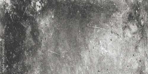 A high resolution monochrome photograph featuring a dark distressed center, creating a dramatic.