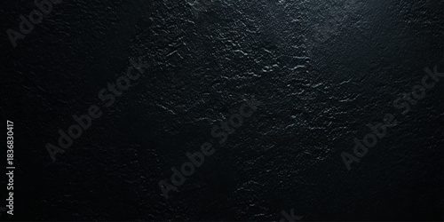 A deep dark gray or charcoal surface with a heavily distressed Ideal as an abstract background, overlay, wallpaper.