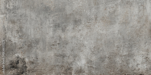 Grungy concrete wall texture industrial distressed gray cement background with rough speckled surface.