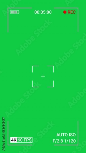 Vertical video of camera screen recording with green background. 4K resolution