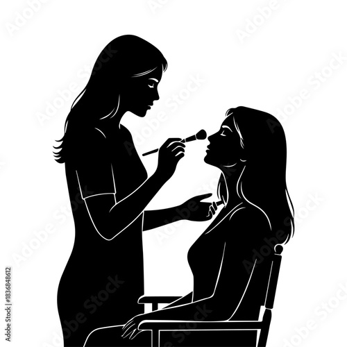 A striking black and white silhouette of a makeup artist applying powder with a brush to a client seated in a chair, illustrating beauty, salon services, and professional cosmetic application.
