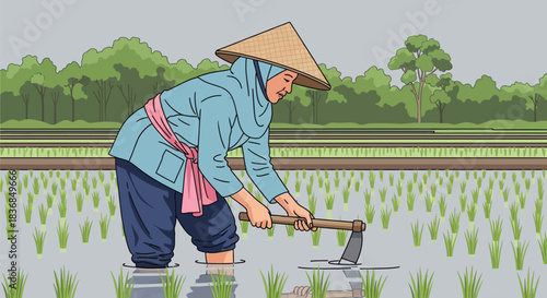 Farmer tending to rice paddy with traditional conical hat and hoe
