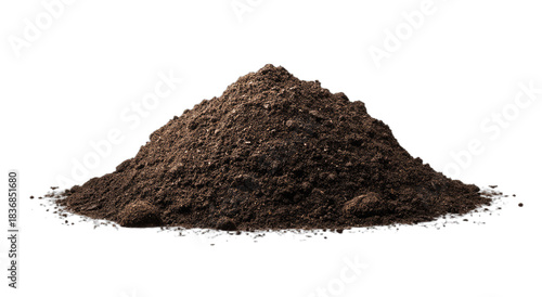 A small pile of dark, rich soil sits on a black background