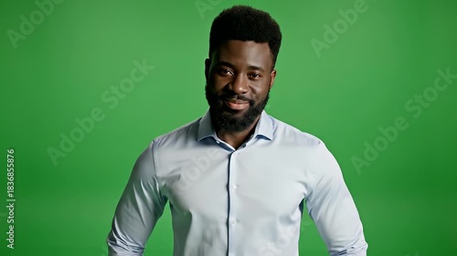 Vivid video portrait of a man in front of a green screen.