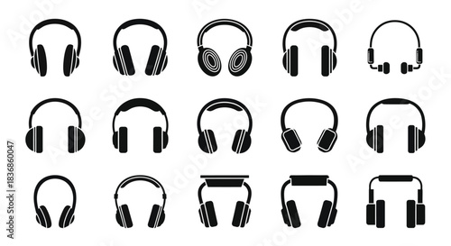 Various black headphones on white background