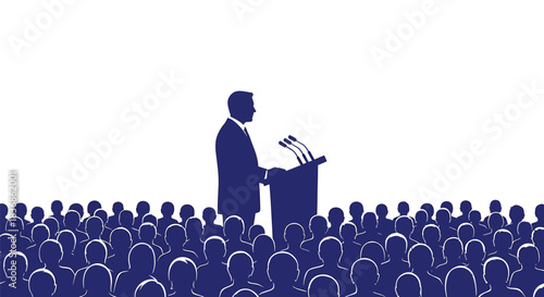 Businessman giving speech to large audience in conference