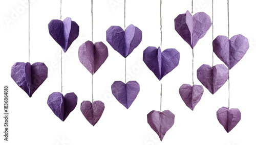 Delicate paper heart shapes hang in a cascading arrangement, creating a festive display