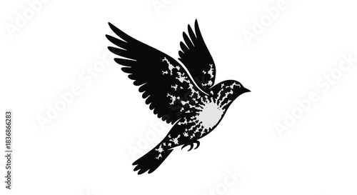 Elegant black bird silhouette in flight with a bright sunburst on its chest, symbolizing freedom and hope.