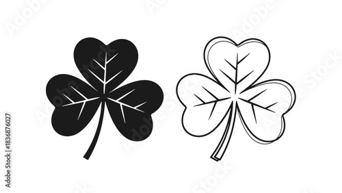 A collection of vibrant green clover leaves, including lucky four-leaf clovers and traditional three-leaf shamrocks, symbolizing good fortune, Irish heritage, and the beauty of nature