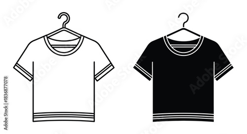 T shirts on hangers in black and white colors