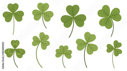 Collection of various green shamrocks and lucky clover leaves on a white background, symbolizing good fortune and Irish heritage