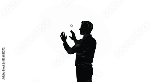 Silhouette of a man skillfully juggling one ball against a clean white background.