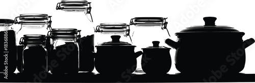 Dark silhouette of jars and pots, kitchenware, and food storage containers