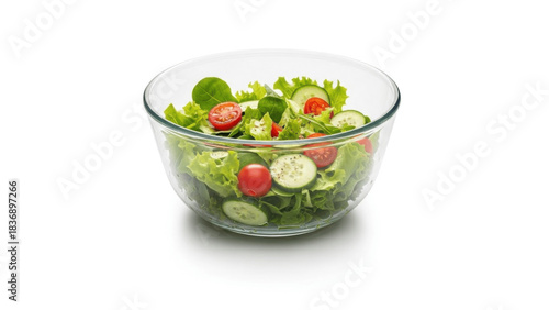 Large clear glass salad bowl filled with fresh lettuce, cucumber and cherry tomatoes, perfect for serving family style salads, fruits or side dishes at home dinners, parties and buffets