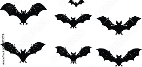 Set of flying bat silhouettes, black vector illustrations with spread wings, halloween spooky icons, isolated on white background