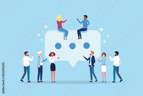 Diverse group of people communicating around a large chat bubble