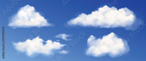 Fluffy white clouds against a vibrant blue sky creating a peaceful atmosphere