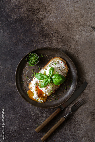 bruschetta with cottage cheese, poached egg and basil