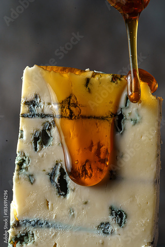 cheese with blue mold dripping honey