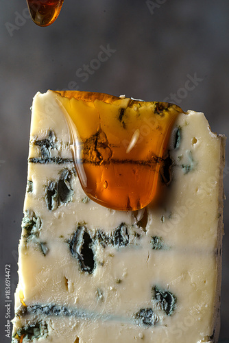 cheese with blue mold dripping honey