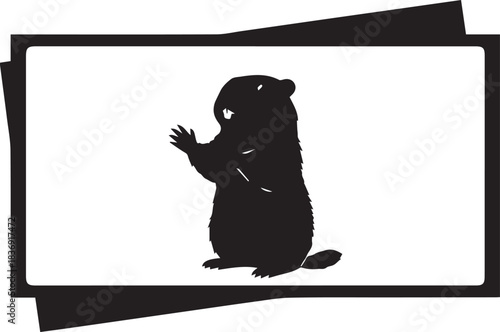 Silhouette of a cute groundhog standing on its hind legs