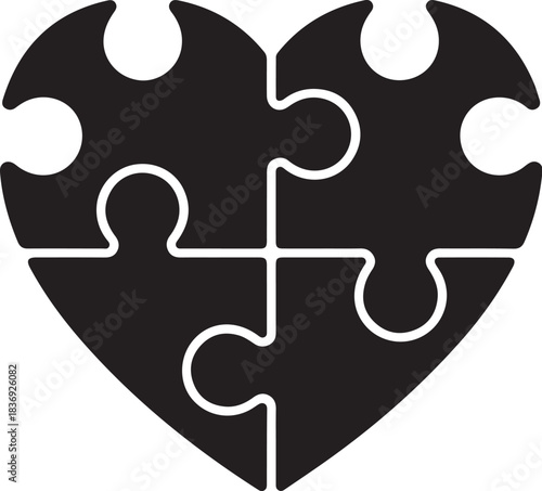 Black heart shape formed by four puzzle pieces jigsaw