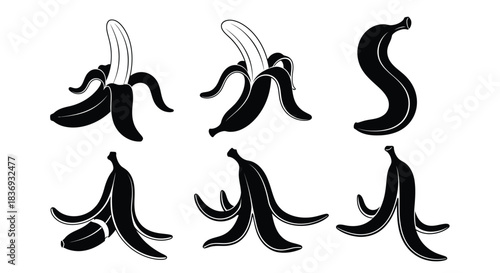 Black banana peels in various stages of peeling