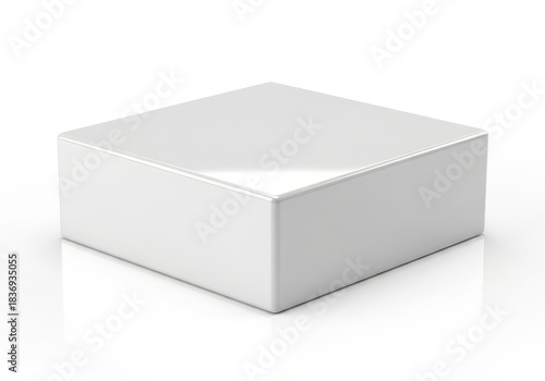 Smooth, glossy white three dimensional square shape rests on a reflective surface