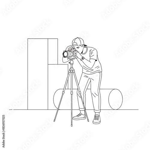 Lone photographer with camera and tripod capturing a moment, isolated on a dark background