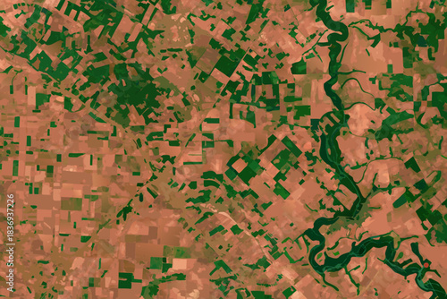 Aerial view of a winding river through agricultural and forested lands