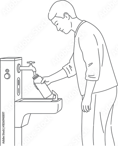 Man Washing Hands with Soap at Sink