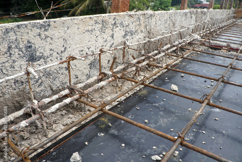 Reinforced concrete structure under construction, which is part of the awning.