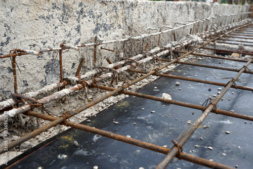 The process of preparing the structure before pouring concrete for the floor or balcony beams.