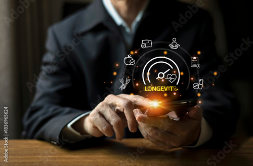 Businessman using smartphone with floating health and longevity icons, symbolizing wellness innovation, digital healthcare, and future lifestyle technology.