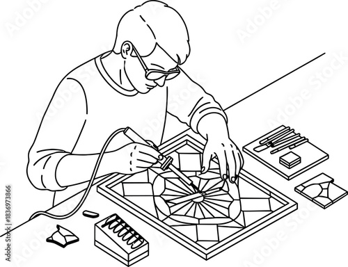 Stained glass artist working on a project