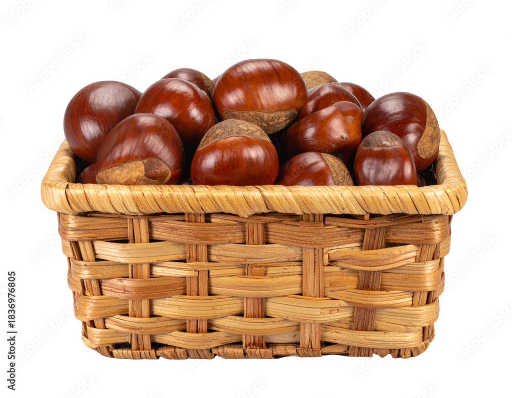Obraz premium Wicker Basket Filled with Fresh Raw Water Chestnuts, Front View, isolated on transparent background