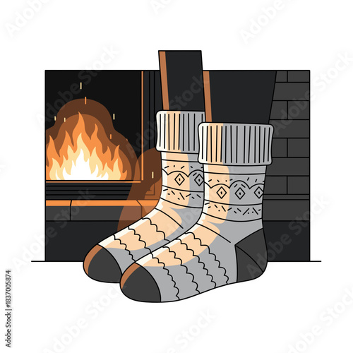 Cozy socks warming by the fireplace in a dark room  