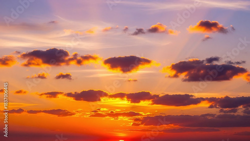 Vibrant Sunset Sky with Fiery Orange and Purple Hues