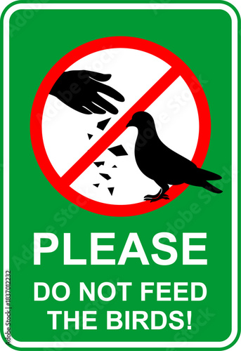 A clear warning sign prohibits feeding birds in public spaces to protect wildlife and maintain hygiene.