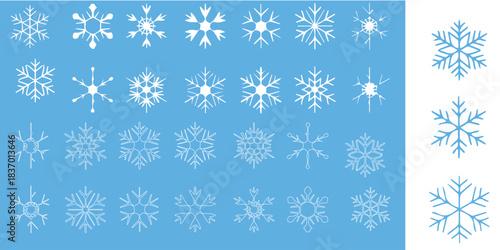 Delicate winter snowflakes on light blue background for elegant holiday designs and festive season marketing campaigns