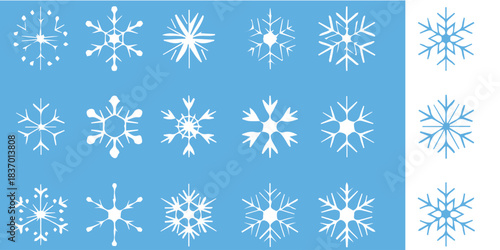 Delicate snowflakes falling gently on light blue background create a magical winter wonderland, perfect for holiday designs.