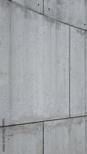 Concrete wall texture with vertical joint line, raw modern architecture surface, vertical 9:16 social media background