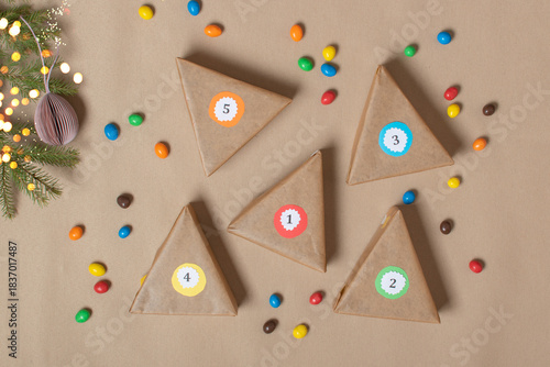 The triangles of the Advent calendar are made of thick cardboard. Step-by-step instructions. Step 8 The calendar is ready